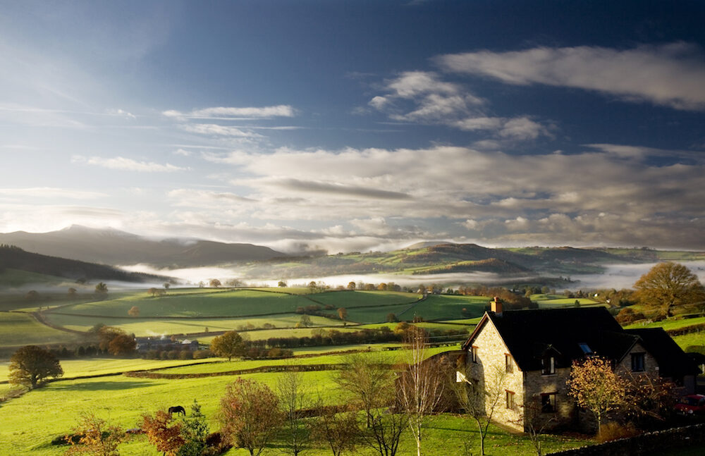 A cottage in the rural countryside of the UK.